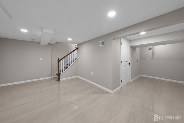 273 Park St, Franklin Twsp, NJ 08873 - finished below grade area featuring stairway, recessed lighting, and baseboards