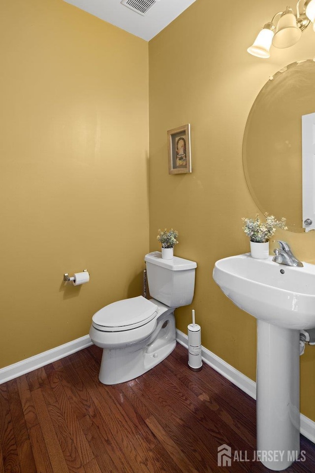15 Homestead Dr, Burlington Twp, NJ 08068 - bathroom featuring toilet, wood finished floors, and baseboards