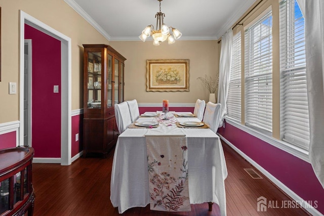 15 Homestead Dr, Burlington Twp, NJ 08068 - dining area with a chandelier, baseboards, crown molding, and hardwood / wood-style floors