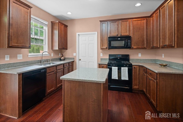 15 Homestead Dr, Burlington Twp, NJ 08068 - kitchen with black appliances, a sink, dark wood-style floors, a kitchen island, and recessed lighting