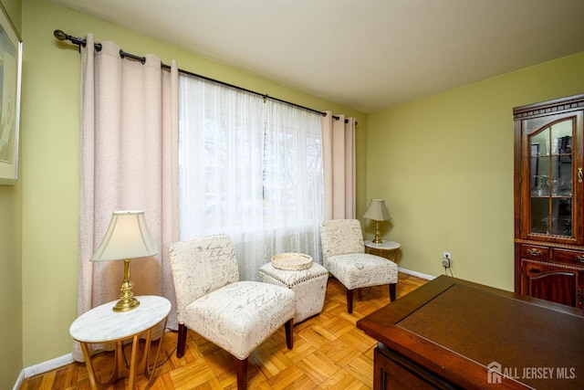 living area with baseboards