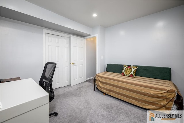 carpeted home office featuring recessed lighting