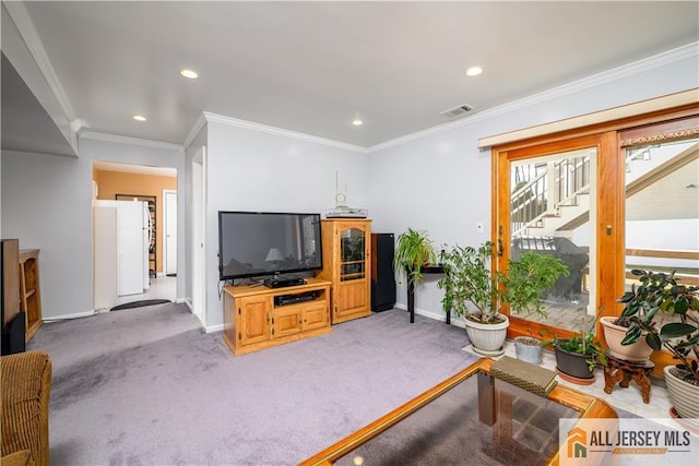 living area featuring light carpet, stairway, crown molding, and baseboards