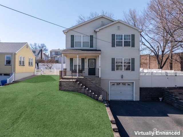 traditional-style home with covered porch, a front lawn, a garage, and fence