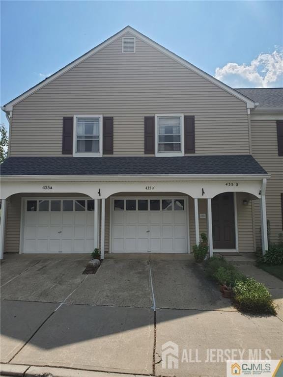 view of property with a garage