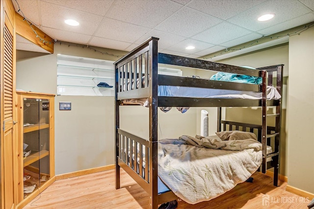 1332 Crescent Ave, Roselle, NJ 07203 - bedroom featuring wood finished floors, baseboards, recessed lighting, and a drop ceiling