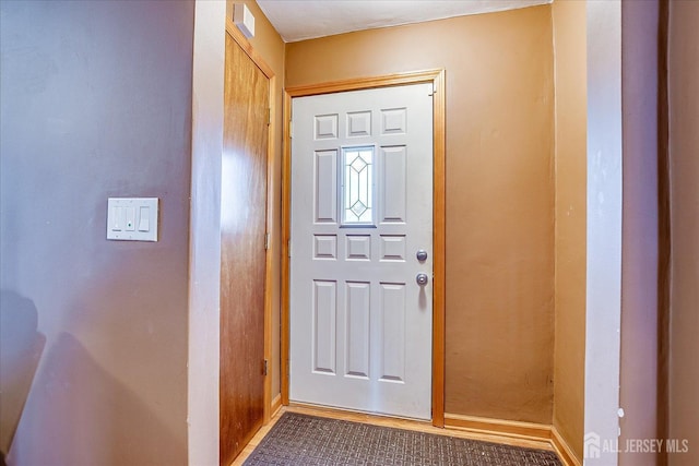 1332 Crescent Ave, Roselle, NJ 07203 - foyer entrance with baseboards and carpet flooring
