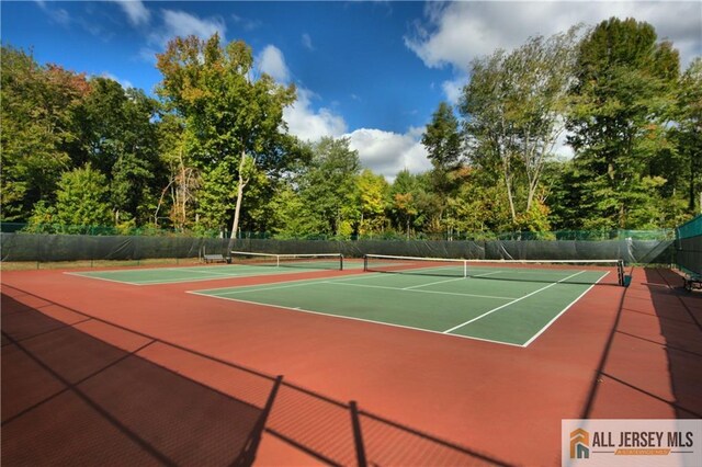 view of tennis court with basketball court