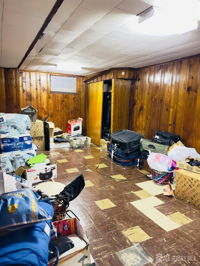 910 Roanoke Ave, Hillside, NJ 07205 - below grade area featuring tile patterned floors and wooden walls