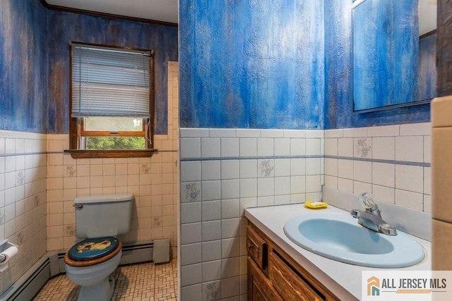 14 Fisher Ave, Middlesex, NJ 08846 - bathroom featuring a baseboard radiator, vanity, tile walls, toilet, and wainscoting