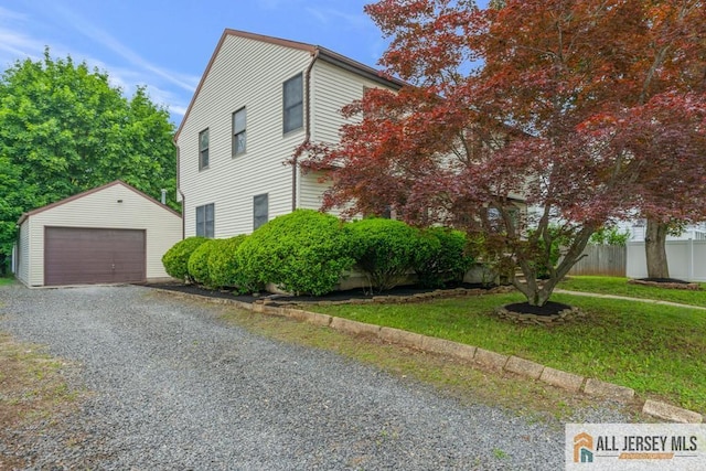 14 Fisher Ave, Middlesex, NJ 08846 - view of side of property with an outdoor structure and a garage
