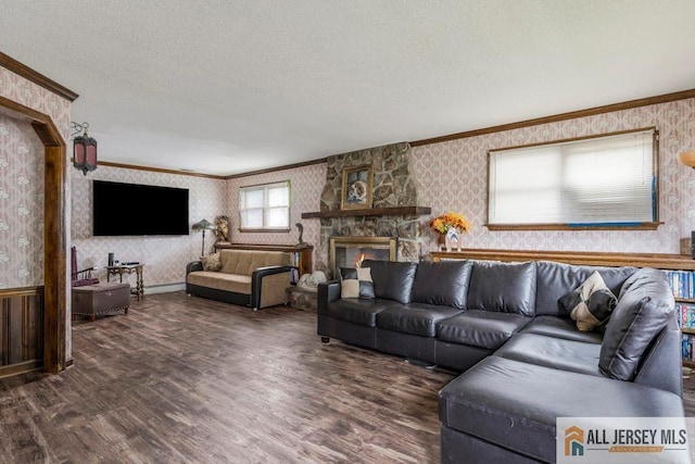 14 Fisher Ave, Middlesex, NJ 08846 - living area featuring wallpapered walls, ornamental molding, a textured ceiling, wood finished floors, and a fireplace