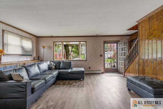14 Fisher Ave, Middlesex, NJ 08846 - living area featuring ornamental molding, wallpapered walls, a baseboard radiator, wood finished floors, and stairway