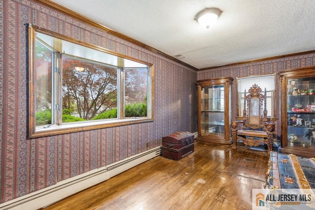 14 Fisher Ave, Middlesex, NJ 08846 - living area with hardwood / wood-style flooring, a baseboard radiator, crown molding, a textured ceiling, and wallpapered walls