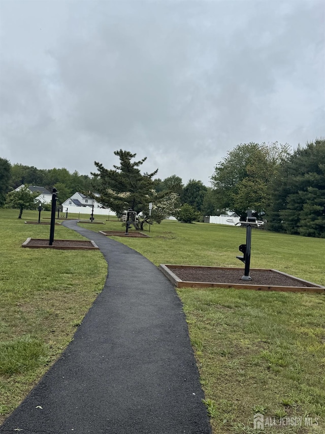 7 Manor Ct, Old Bridge, NJ 08857 - surrounding community with a lawn