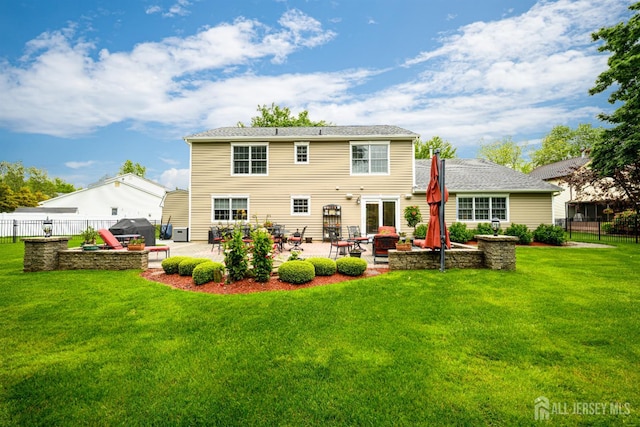 7 Manor Ct, Old Bridge, NJ 08857 - rear view of property featuring a patio and a fire pit