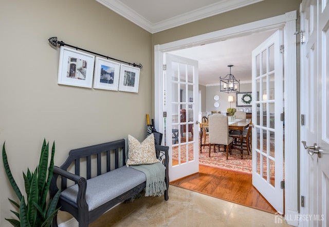 7 Manor Ct, Old Bridge, NJ 08857 - living area featuring crown molding, a chandelier, and french doors