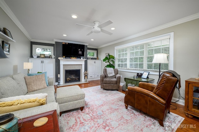 7 Manor Ct, Old Bridge, NJ 08857 - living room featuring ornamental molding, wood finished floors, a ceiling fan, a glass covered fireplace, and recessed lighting
