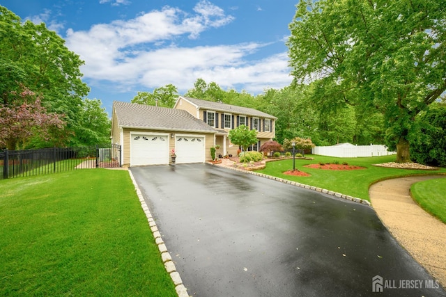 7 Manor Ct, Old Bridge, NJ 08857 - view of front of property with asphalt driveway and a garage