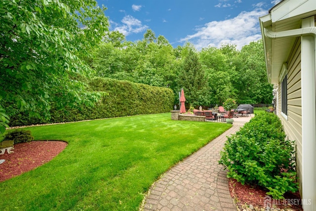 7 Manor Ct, Old Bridge, NJ 08857 - view of grassy yard featuring a patio area