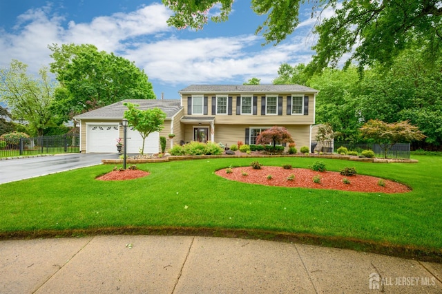 7 Manor Ct, Old Bridge, NJ 08857 - view of front of home featuring asphalt driveway and a garage