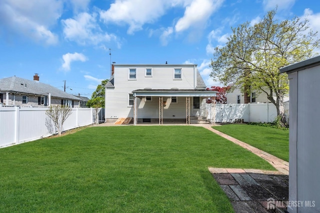 rear view of house with a patio