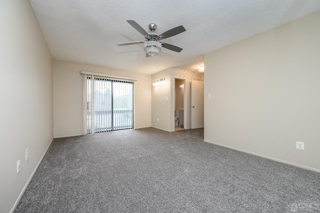 empty room with ceiling fan, a textured ceiling, and carpet flooring