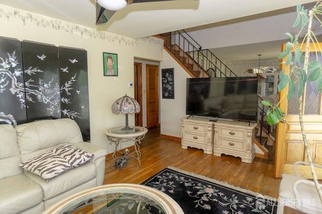 35 Barkalow St, South Amboy, NJ 08879 - living area with wood finished floors, stairs, and baseboards