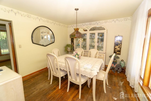 35 Barkalow St, South Amboy, NJ 08879 - dining room with dark wood-type flooring and baseboards