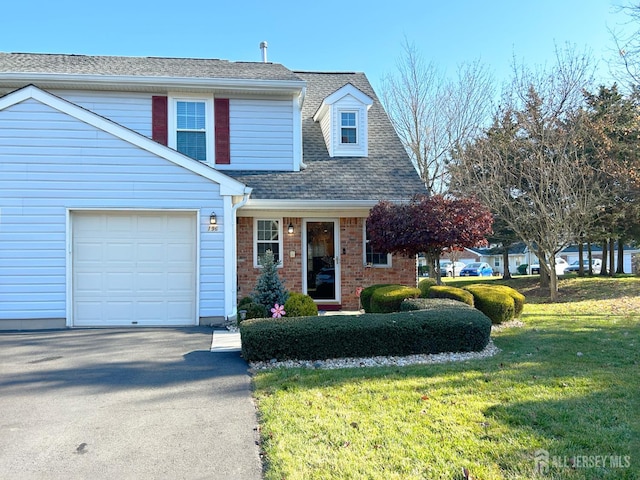 196 Jonathan Pl, Franklin Twsp, NJ 08873 - traditional home featuring a front yard, driveway, a garage, a shingled roof, and brick siding