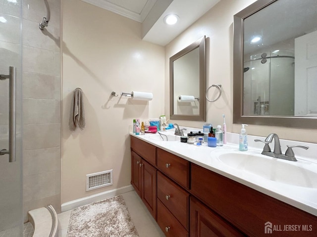 196 Jonathan Pl, Franklin Twsp, NJ 08873 - full bath featuring ornamental molding, a shower stall, double vanity, and recessed lighting