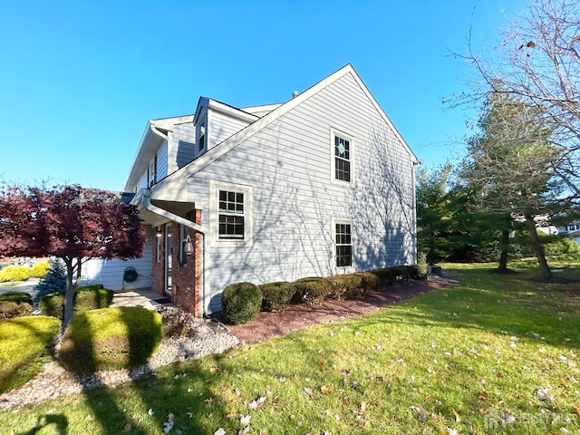 196 Jonathan Pl, Franklin Twsp, NJ 08873 - view of property exterior featuring a yard