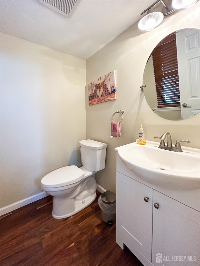 196 Jonathan Pl, Franklin Twsp, NJ 08873 - half bath featuring wood finished floors and vanity