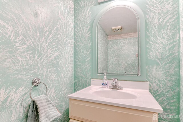 62 La Rue Ln, East Brunswick, NJ 08816 - bathroom featuring vanity and wallpapered walls