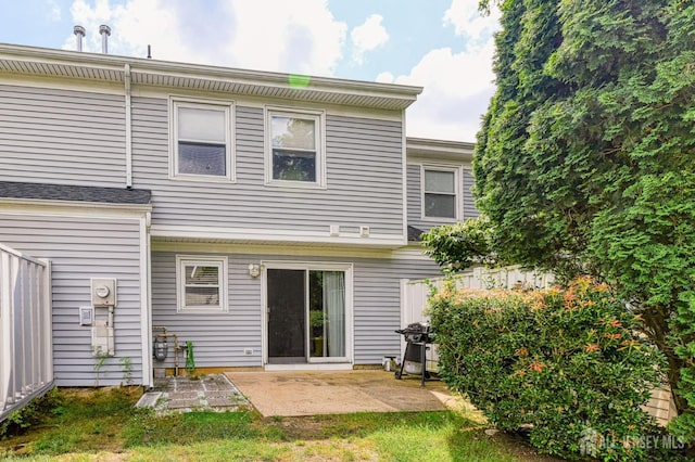 62 La Rue Ln, East Brunswick, NJ 08816 - rear view of property featuring a patio area