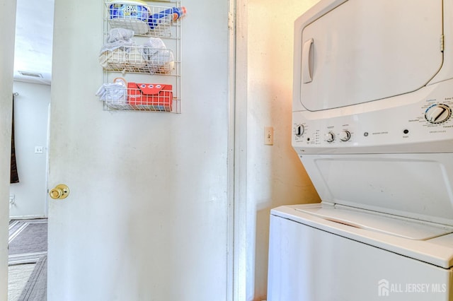 62 La Rue Ln, East Brunswick, NJ 08816 - laundry area with stacked washing machine and dryer