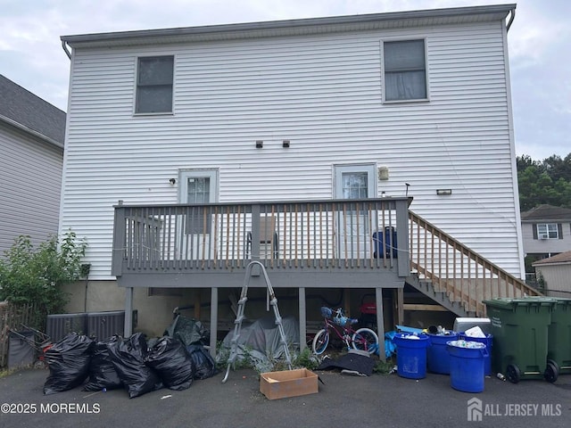 13 Haag St, Sayreville, NJ 08872 - rear view of property with a deck and stairs