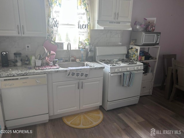 13 Haag St, Sayreville, NJ 08872 - kitchen featuring white appliances, under cabinet range hood, white cabinetry, and wood finished floors