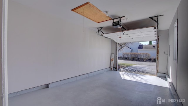 52-C Rutland Ln, Monroe, NJ 08831 - garage featuring a garage door opener
