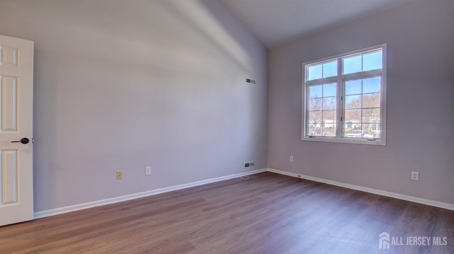 52-C Rutland Ln, Monroe, NJ 08831 - spare room featuring wood finished floors and baseboards
