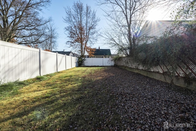 view of yard featuring a fenced backyard