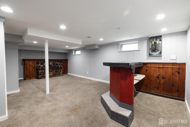 bar featuring recessed lighting, baseboards, light carpet, and a dry bar