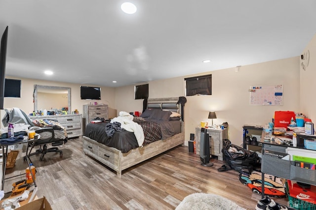 bedroom featuring hardwood / wood-style flooring