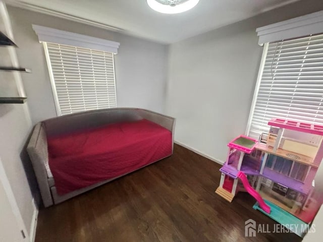 45 E Oak St, Carteret, NJ 07008 - bedroom featuring wood finished floors and baseboards
