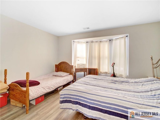285 Cozzens Ct Unit 285, East Brunswick, NJ 08816 - bedroom with light wood finished floors
