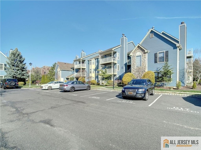 285 Cozzens Ct Unit 285, East Brunswick, NJ 08816 - view of property with uncovered parking
