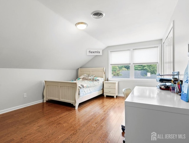 13 Crabtree Rd, Old Bridge, NJ 07747 - bedroom featuring wood finished floors, lofted ceiling, and baseboards