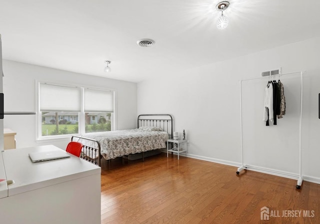 13 Crabtree Rd, Old Bridge, NJ 07747 - bedroom featuring wood finished floors and baseboards