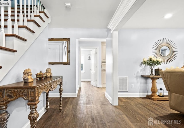 13 Crabtree Rd, Old Bridge, NJ 07747 - hall with wood finished floors, baseboards, and stairs
