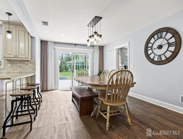 13 Crabtree Rd, Old Bridge, NJ 07747 - dining space featuring wood finished floors and baseboards